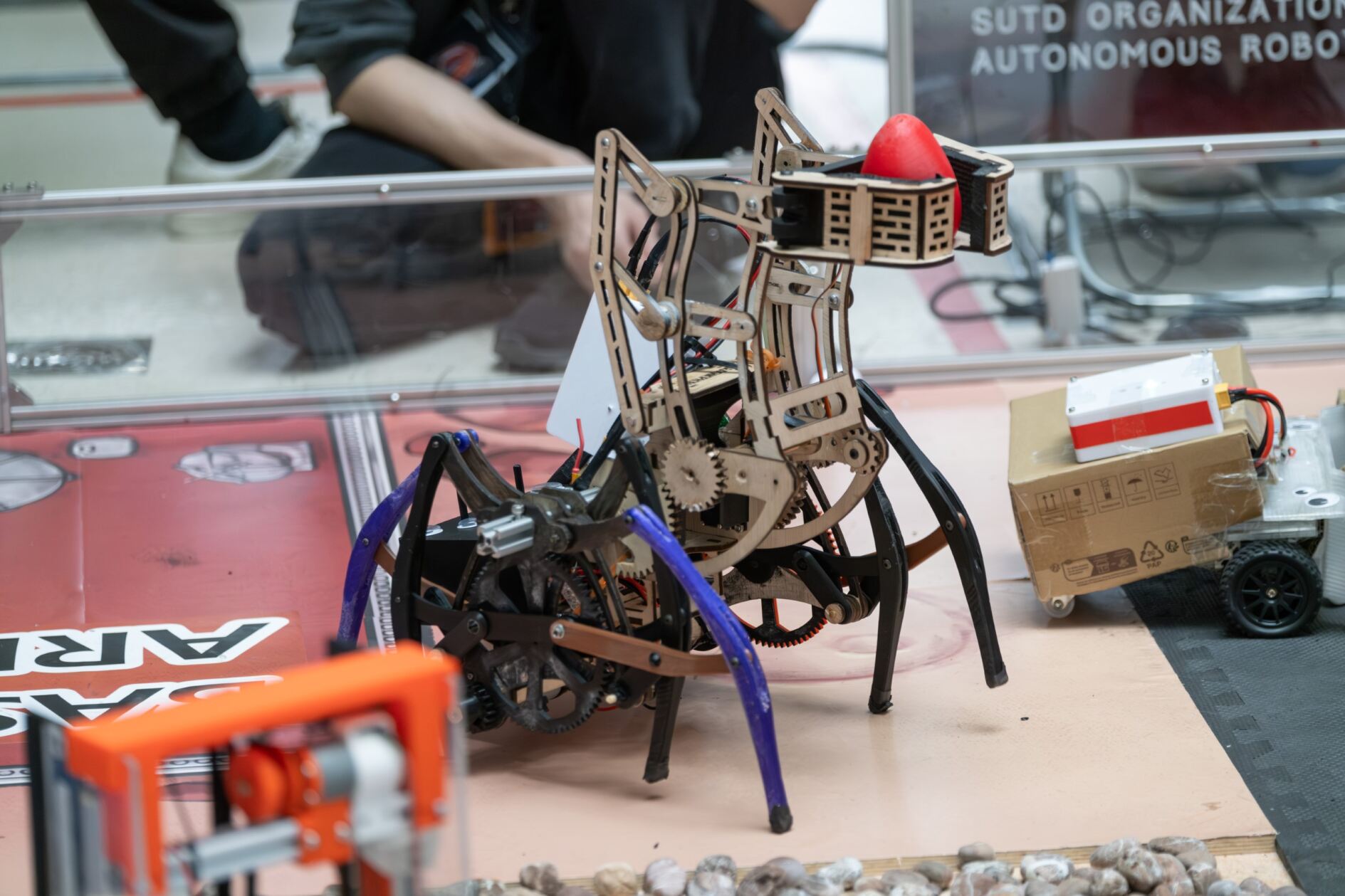 Arachnophobia holding up a rock